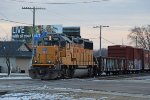 UP 1025 follows a gondola, three boxcars and sister 1145 toward Five Points and the UP yard